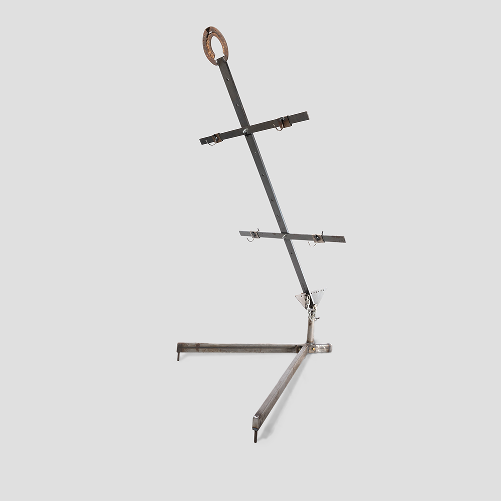 Classic Cross with base — essential campfire cooking equipment.